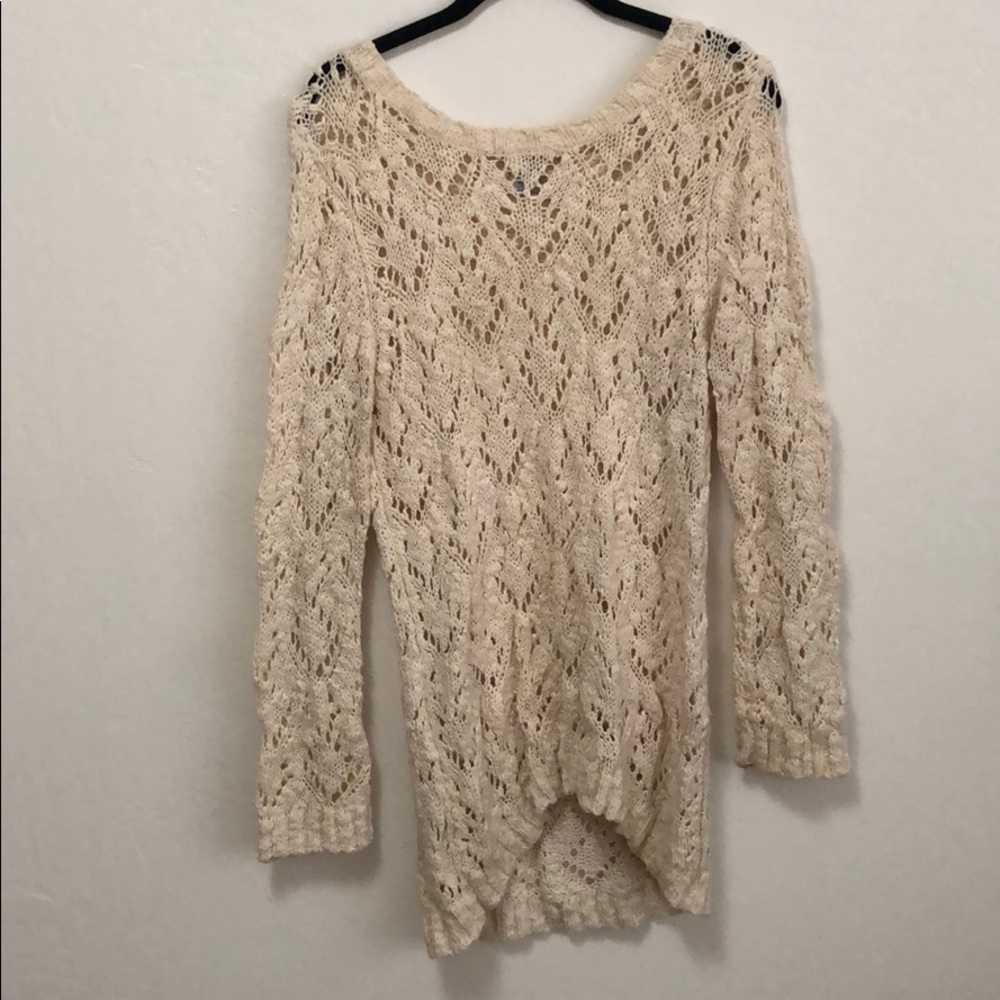 Long cream sweater
